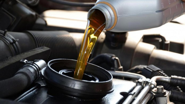 Как самостоятельно заменить масло в механической коробке передач автомобиля Ford Cougar?